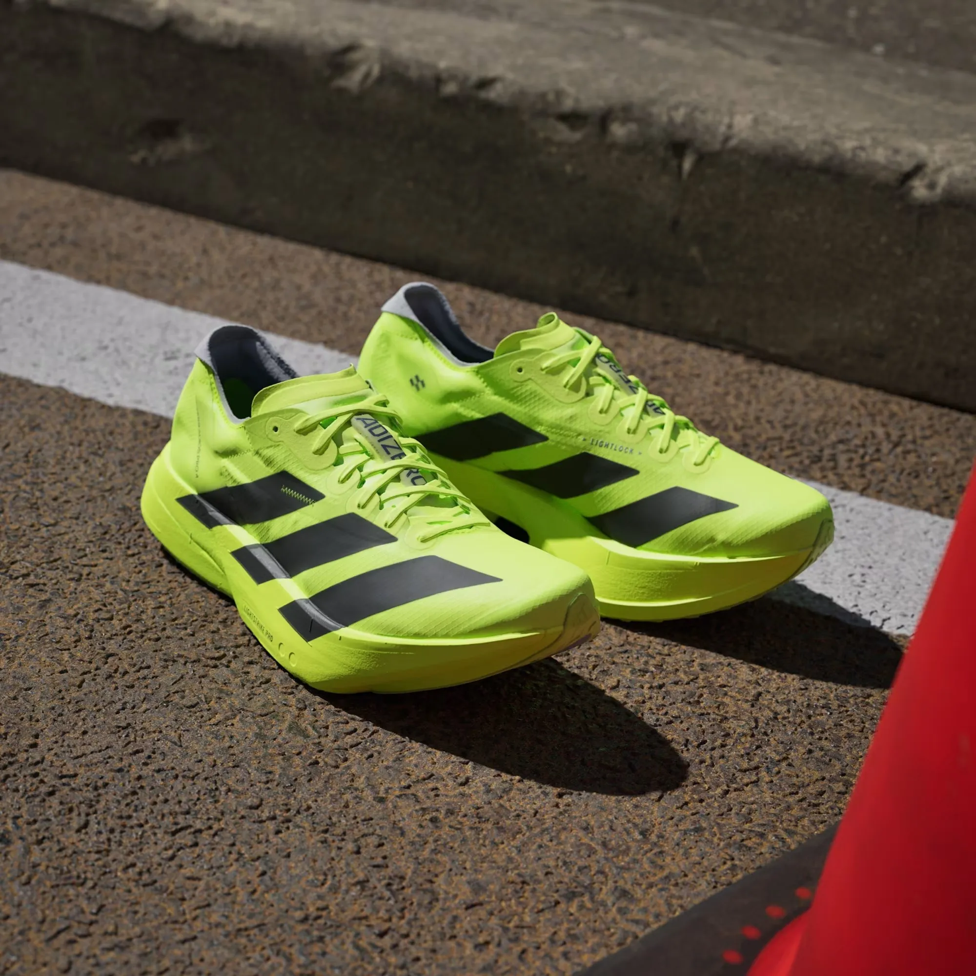Adizero Adios Pro 4 W | Lucid Lemon/Core Black/Halo Silver